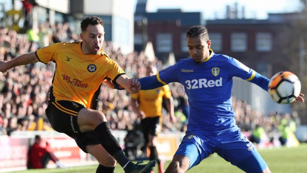 Newport County's Robbie Willmott and Leeds United's Cameron Borthwick-Jackson during their FA Cup third round match at Rodney Parade in Newport on Sunday.