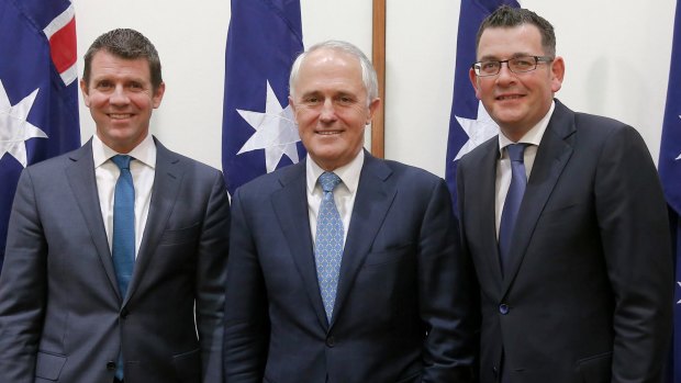 NSW Premier Mike Baird, Prime Minister Malcolm Turnbull and Victorian Premier Daniel Andrews during the signing of National Disability Insurance Scheme agreements.