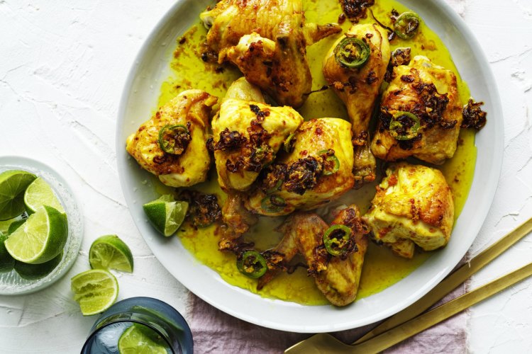 
Alison Roman's Turmeric-rubbed chicken with spicy fried shallots.