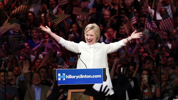 Hillary Clinton celebrates becoming the presumptive Democratic nominee on Tuesday night at a rally in Brooklyn, New York.