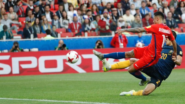 Chile's Martin Rodriguez drives the equaliser home.