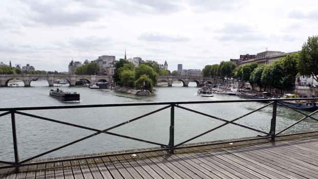 The lock-free railings of the famed Pont des Arts bridge in Paris.