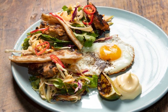 Balinese-style chicken with apple slaw and roti.