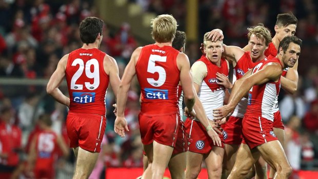 Big comeback: Dan Hannebery of the Swans celebrates a goal.