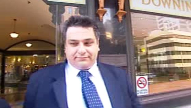 Screen shot of ice dealing solicitor Nicholas Gouliaditis coming out of the Downing Centre, 1 October 2015. Credit Seven News