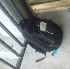 The backpack containing fireworks and carrying a sign saying 'bomb' found in an Ubud street.