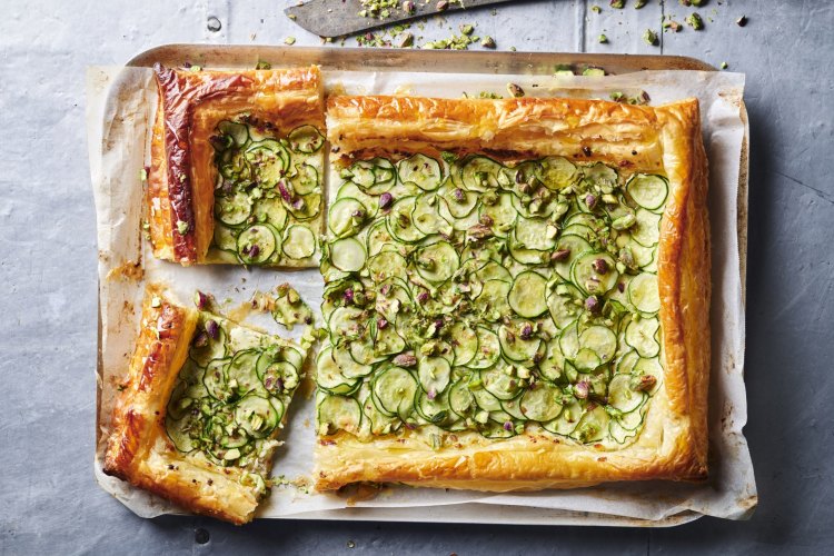 Five-ingredient zucchini cheese tart with honey and pistachio recipe. 