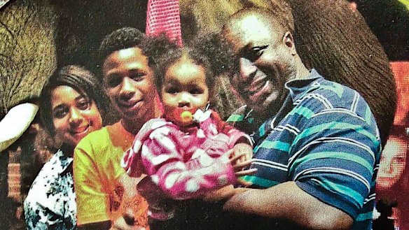 Happier times: Eric Garner and his family.    