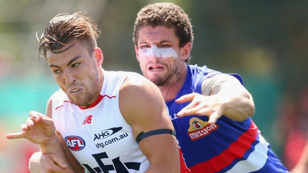 Highly-effective: Liberatore tackles Melbourne's Jack Viney.