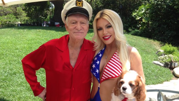 Hugh Hefner and his wife Crystal at the Playboy Mansion on July 4, 2013 in a photograph taken by Andrew Hornery.