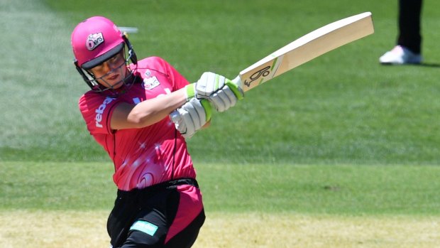 On front foot: Ellyse Perry takes toll of the Scorchers attack at Adelaide Oval.