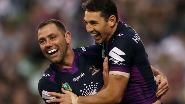 Old firm: Cameron Smith and Billy Slater celebrate the fullback's try.
