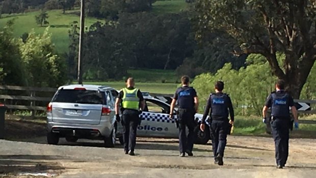 Police on Hayes Road, where Carl Richardson was found dead.