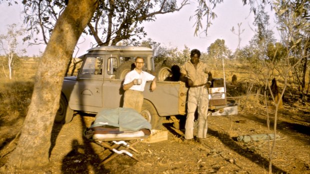 Dr Bob Kirk with an unknown man at Pineapple Bore, Kimberley, WA, in 1960 during the collection of blood samples.