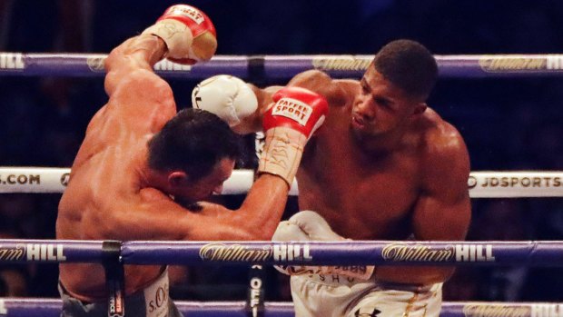 On his way: British boxer Anthony Joshua, right, fights Ukrainian boxer Wladimir Klitschko for Joshua's IBF and the vacant WBA Super World and IBO heavyweight titles at Wembley stadium in London.