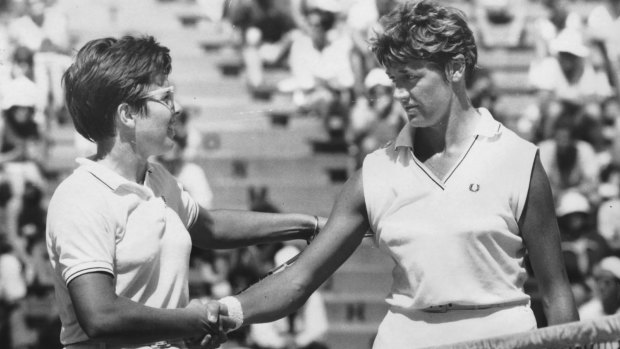 Margaret Court (right) congratulates Billie Jean King on her win in the women's singles final at Kooyong in 1968.