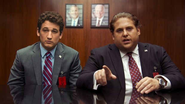 Miles Teller, left, and Jonah Hill in a scene from <i>War Dogs.</i> 