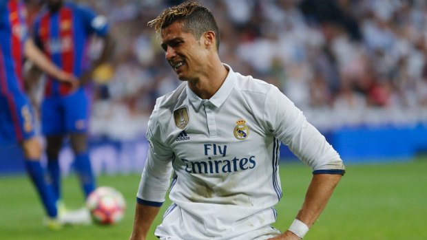 Real Madrid's Cristiano Ronaldo feels the pain after a missed scoring chance.