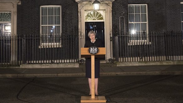 British Prime Minister Theresa May makes a statement in Downing street following the Wednesday terrorist incident in Westminster.