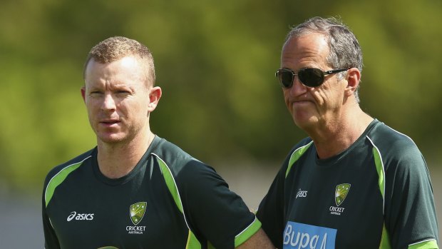 New regime: Australian team doctor Peter Brukner informs opener Chris Rogers he will not be allowed to play in the first Test against the West Indies.