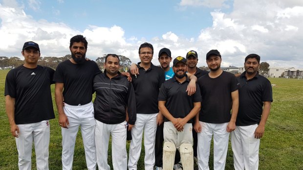 Zeeshan Akbar (back centre) with his cricket mates from the 'Canberra Sharks'. 