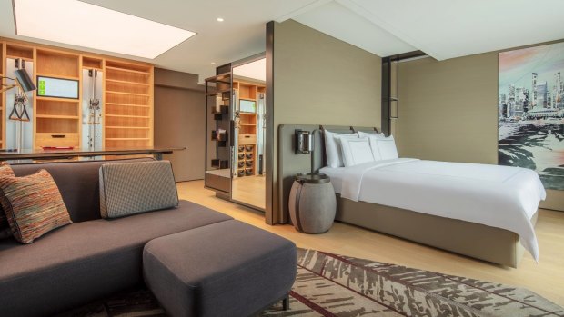 Swissotel The Stamford's Vitality Rooms feature an in-room yoga station and a wellness wall.