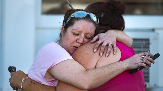 Two women embrace after the fatal shooting at the First Baptist Church in Sutherland Springs,Texas. 