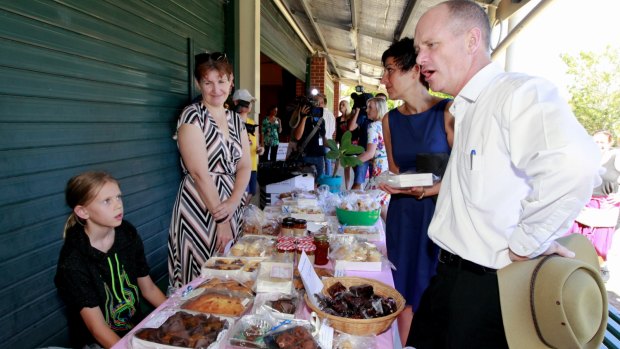 Premier Campbell Newman speaks to people locals at Newmarket State School, Brisbane.