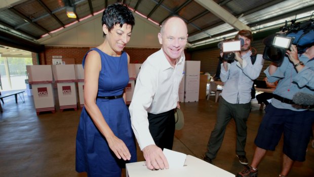 Premier Campbell Newman and His wife Lisa voting at Newmarket State School on election day, Brisbane.