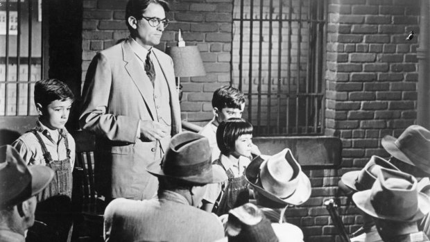 Atticus Finch and his children in the 1962 film version of <i>To Kill A Mockingbird</i>: Harper Lee's <i>Go Set A Watchman</i> revisits the characters decades later.