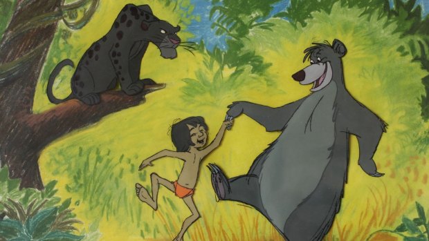 Bagheera watches Mowgli and Baloo dance in Disney's 1967 animated version.