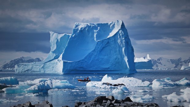 Icebergs grounded near Adelaide Island, Antarctic Peninsula. The Antarctic Peninsula is one of the most rapidly warming parts of the continent.