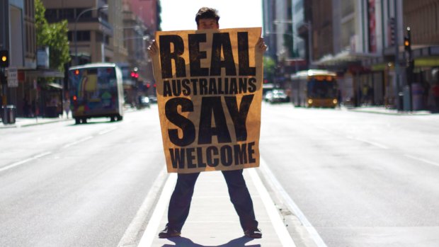 Street artist Peter Drew is putting up 1000 posters around Australia.