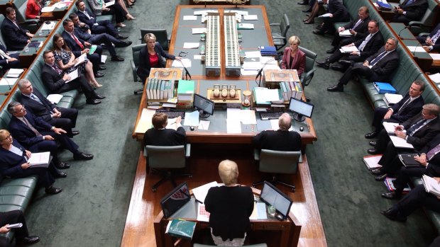 Speaker Julie Bishop addresess the House as Acting Prime Minister Julie Bishop and Acting Opposition Leader Tanya Plibersek sit at the table during question time on December 3.