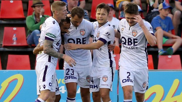 On their way: Perth Glory celebrate a goal by Krisztian Vadocz.