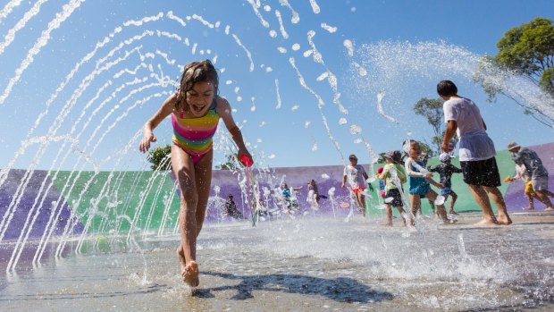 Families cooled off at Blaxland Riverside Park in Parramatta as the mercury topped 40 degrees. 