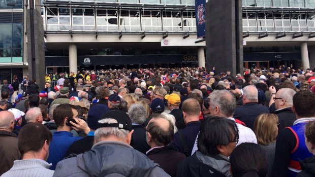 The Grand Final day queue for tickets outside the MCG Members Stand.