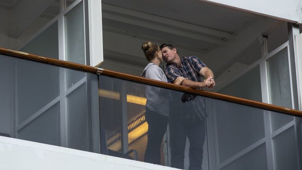 Passengers on the Carnival Spirit after it docked.