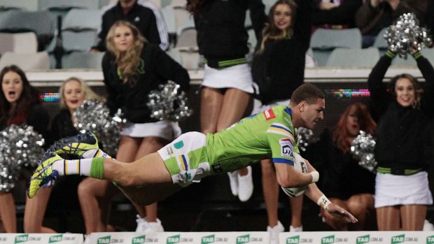 Brenko Lee scores a try during the game against Manly.