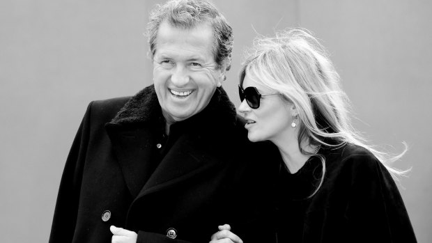 With photographer Mario Testino in London, 2015.