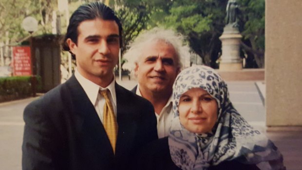 Houda with his mother and father.