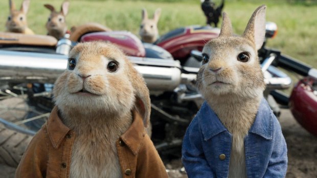 This image released by Columbia Pictures shows characters Benjamin, voiced by Colin Moody, left, and Peter Rabbit, voiced by James Corden and Cottontail in a scene from Peter Rabbit.