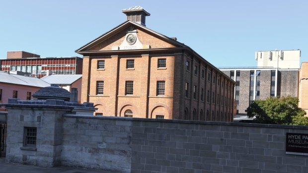 The Hyde Park Barracks on Macquarie Street, with buildings to be demolished at rear.
