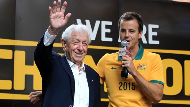 "Wonderful, wonderful, wonderful": Frank Lowy with sports presenter Adam Peacock. 