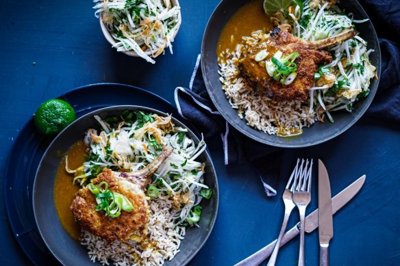Crumbed pork cutlets with Japanese curry sauce, rice and kohlrabi, kimchi and coriander slaw.