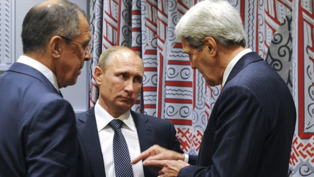 Russian Foreign Minister Sergey Lavrov, left, and President Vladimir Putin listen to US Secretary of State John Kerry before a bilateral meeting in New York on Monday.