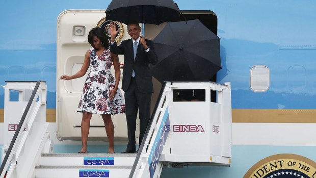 US President Barack Obama and Michelle Obama arrive at Jose Marti International Airport in Havana, Cuba.  