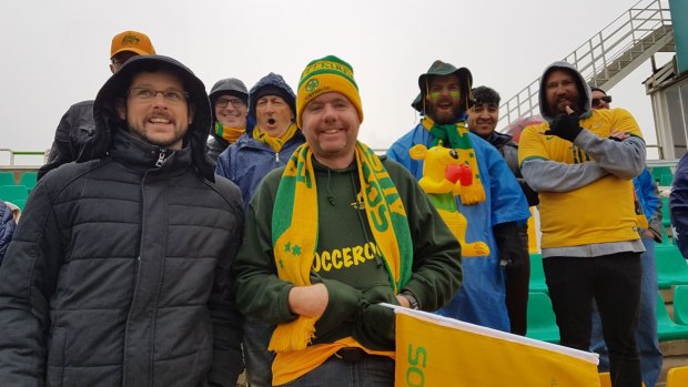 Tobias Ortner, left, with the Green and Gold Army in Tehran for a match against Iraq.