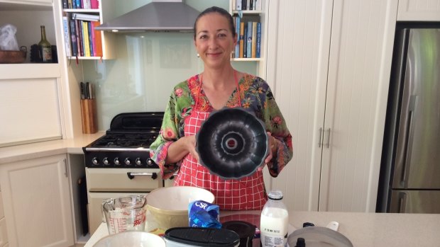 Canberra MP Gai Brodtmann in the kitchen on Friday baking her Shine Dome cake to help new mums coping with anxiety and depression.