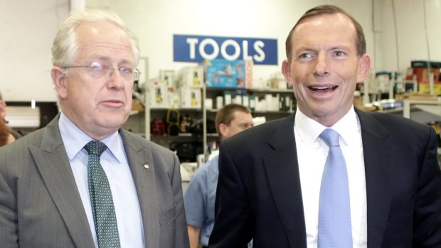 Tony Abbott tours a hardware store with Liberal candidate Dr Michael Feneley.